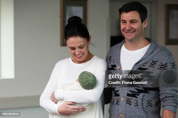 New Zealand Prime Minister Jacinda Ardern and her partern Clarke Gayford pose for a photo with their new baby girl Neve Te Aroha Ardern Gayford June...