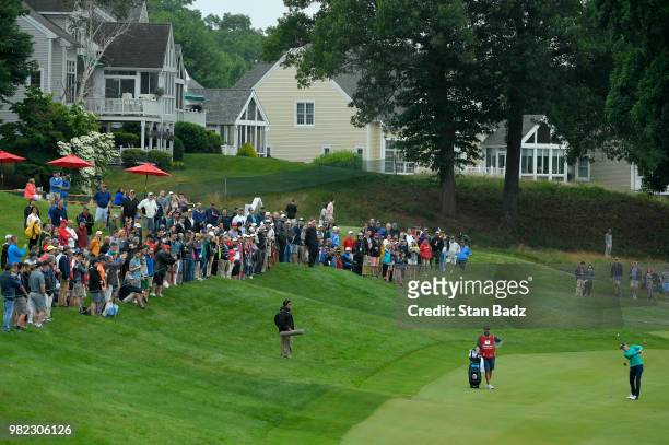 Jordan Spieth plays a shot on the 18th hole during the third round of the Travelers Championship at TPC River Highlands on June 23, 2018 in Cromwell,...