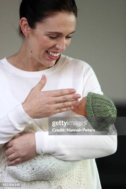 New Zealand Prime Minister Jacinda Ardern poses for a photo with her new baby girl Neve Te Aroha Ardern Gayford on June 24, 2018 in Auckland, New...