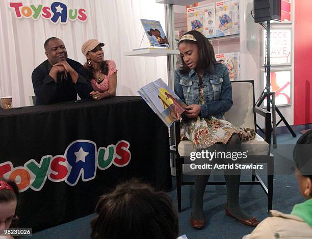 Rodney Peete, wife Holly Robinson Peete and daughter Ryan Elizabeth Peete promote "My Brother Charlie" and "Not My Boy" at Toys R Us on April 3, 2010...