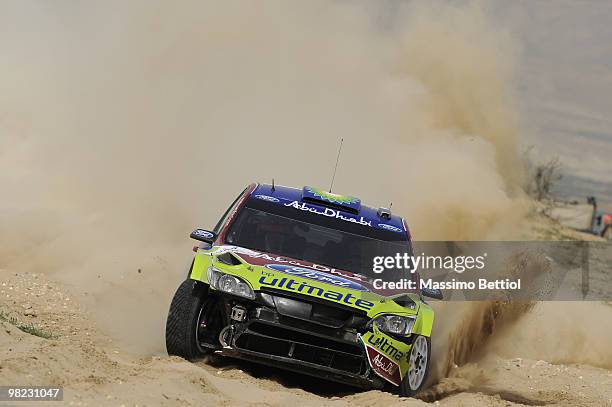 Mikko Hirvonen of Finland and Jarmo Lehtinen of Finland compete in their BP Abu Dhabi Ford Focus during Leg 3 of the WRC Rally Jordan on April 3,...