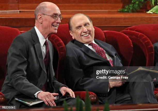 President of the Church of Jesus Christ of Latter-Day Saints Thomas Monson shares a light moment with his first councilor Henry Eyring before the...