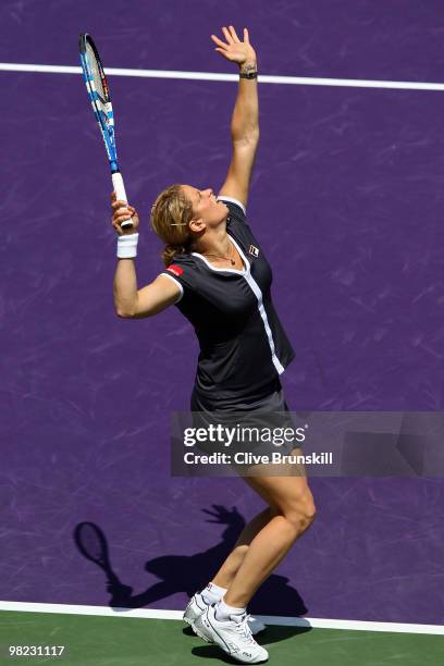 Kim Clijsters of Belgium serves against Venus Williams of the United States during the women's final of the 2010 Sony Ericsson Open at Crandon Park...