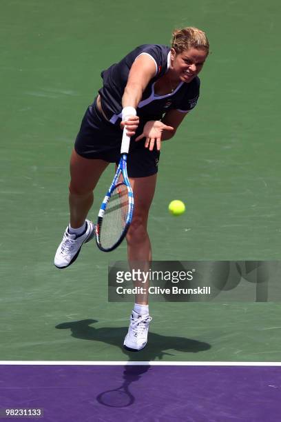 Kim Clijsters of Belgium serves against Venus Williams of the United States during the women's final of the 2010 Sony Ericsson Open at Crandon Park...