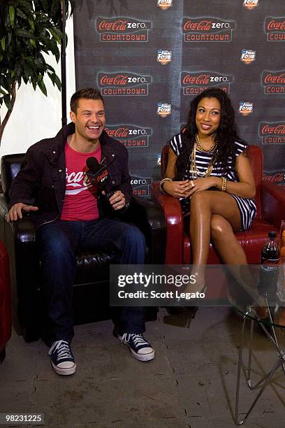 Ryan Seacrest and Melanie Fiona backstage during day 2 of the NCAA 2010 Big Dance Concert Series at White River State Park on April 3, 2010 in...