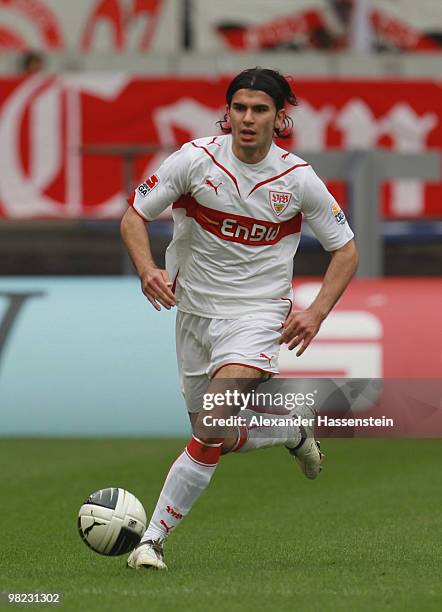 Serdar Tasci of Stuttgart runs with the ball during the Bundesliga match between VfB Stuttgart and Borussia Moenchengladbach at Mercedes-Benz Arena...