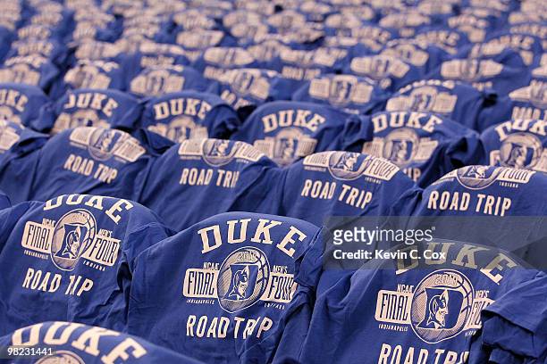 Final four t-shirts with the logo of the Duke Blue Devils are seen on the backs of chairs against the West Virginia Mountaineers during the National...