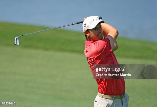 Padraig Harrington of Ireland hits his fourth shot on the fifth hole during the third round of the Shell Houston Open at Redstone Golf Club on April...