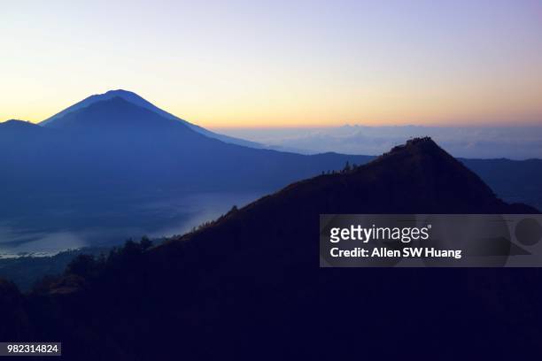mount batur rising - allen sw huang stock pictures, royalty-free photos & images