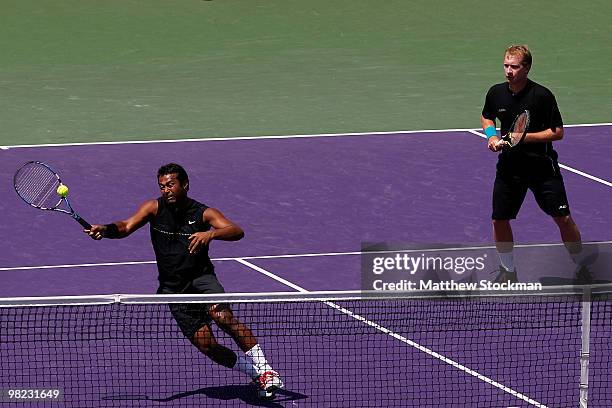 Lukas Dlouhy of the Czech Republic and Leander Paes of India celebrate play against Mahesh Bhupathi of India and Max Mirnyi of Belarus during the...