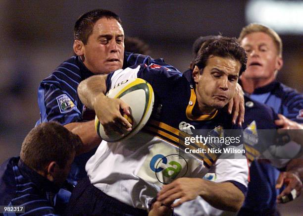 Mark Bartholomeusz of the ACT Brumbies takes the ball forward during the Super 12 Match between the ACT Brumbies and the Nothern Bulls played at...