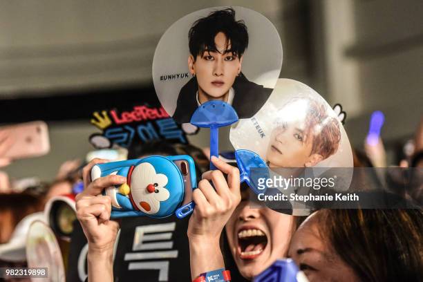 Fans of Korean pop music attend a convention, called Kcon, that brings together some of the most popular pop bands from Korea on June 23, 2018 in...