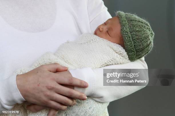 New Zealand Prime Minister Jacinda Ardern poses for a photo with her new baby girl Neve Te Aroha Ardern Gayford on June 24, 2018 in Auckland, New...