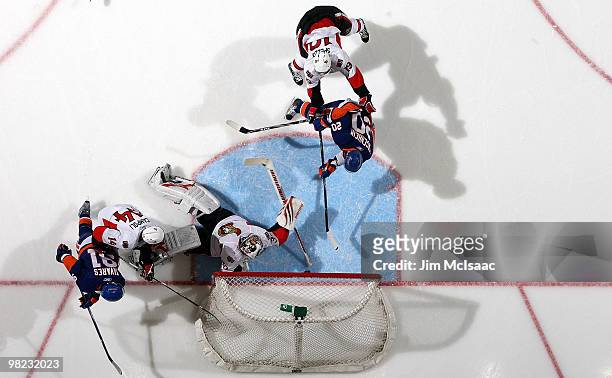 Sean Bergenheim of the New York Islanders scores a third period goal past Brian Elliott of the Ottawa Senators on April 3, 2010 at Nassau Coliseum in...