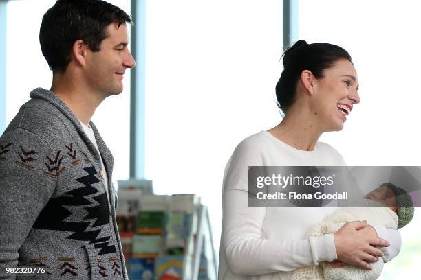 New Zealand Prime Minister Jacinda Ardern and partner Clarke Gayford pose for a photo with their new baby girl Neve te Aroha Ardern Gayford on June...