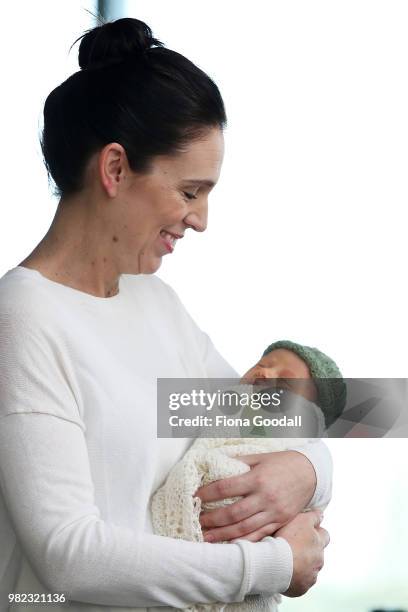 New Zealand Prime Minister Jacinda Ardern poses for a photo with their new baby girl Neve te Aroha Ardern Gayford on June 24, 2018 in Auckland, New...