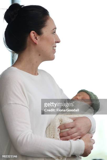 New Zealand Prime Minister Jacinda Ardern poses for a photo with their new baby girl Neve te Aroha Ardern Gayford on June 24, 2018 in Auckland, New...