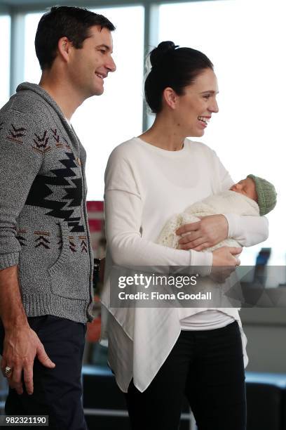 New Zealand Prime Minister Jacinda Ardern and partern Clarke Gayford poses for a photo with their new baby girl Neve Te Aroha Ardern Gayford on June...