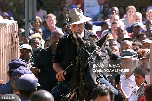 In this file picture taken on March 30, 2000 Eugene Terre'Blanche, leader of the AWB white power movement,shows up at the Potchefstroom court on a...