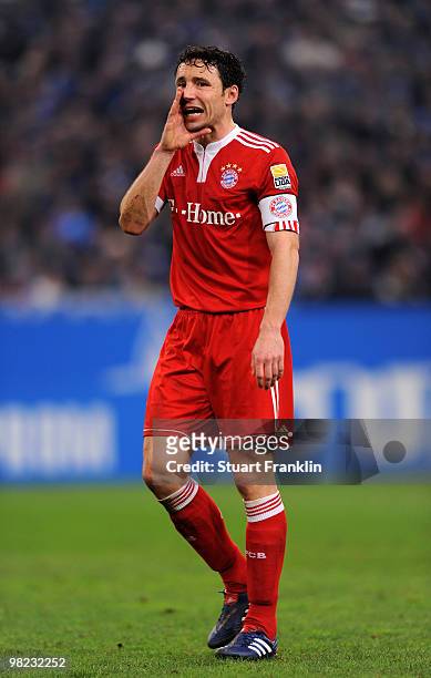 Mark Van Bommel of Bayern during the Bundesliga match between FC Schalke 04 and FC Bayern Muenchen at the Veltins Arena on April 3, 2010 in...