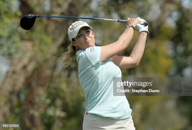 Cristie Kerr hits her tee shot on the third hole during the third round of the Kraft Nabisco Championship at Mission Hills Country Club on April 3,...