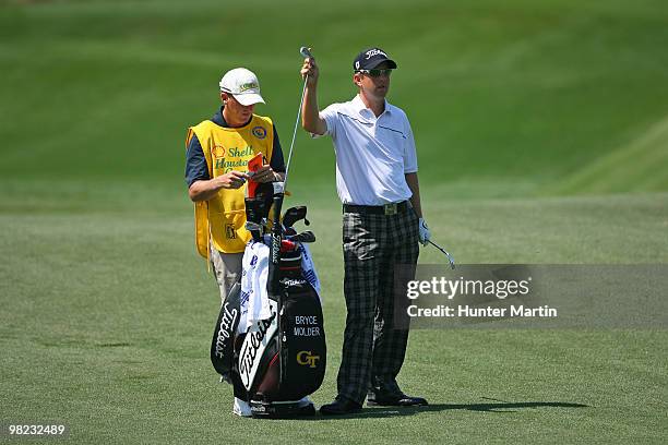 Bryce Molder pulls a club from his bag on the fifth hole during the third round of the Shell Houston Open at Redstone Golf Club on April 3, 2010 in...