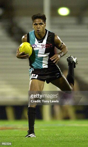 Che Cockatoo-Collins of Port Adelaide in action during the Ansett Cup Grand Final between the Brisbane Lions and Port Power played at Football Park...