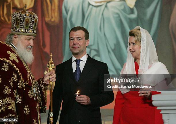 Russian Orthodox Patriarch Kirill, Russian President Dmitry Medvedev, his spouse Svetlana Medvedeva attend an Easter celebration mess at the Christ...
