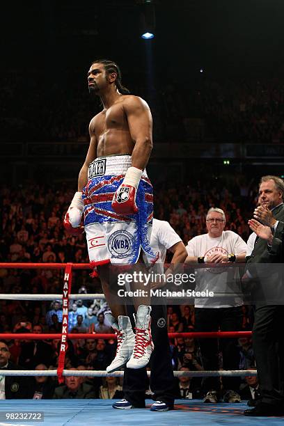 David Haye of England leaps into the air prior to the first round against John Ruiz of USA during the World Heavyweight Bout at the MEN Arena on...