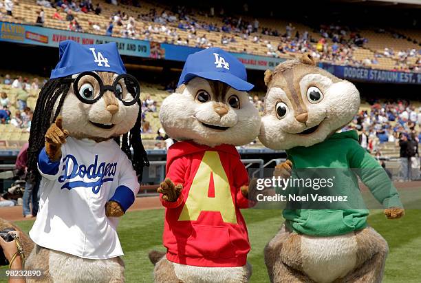 People dressed as the characters 'Alvin, Simon and Theodore' attend the "Alvin And The Chipmunks: The Squeakquel" DVD promotion at Dodger Stadium on...