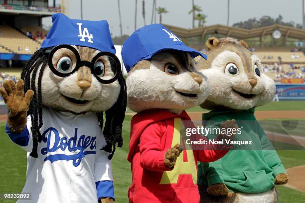 People dressed as the characters 'Alvin, Simon and Theodore' attend the "Alvin And The Chipmunks: The Squeakquel" DVD promotion at Dodger Stadium on...