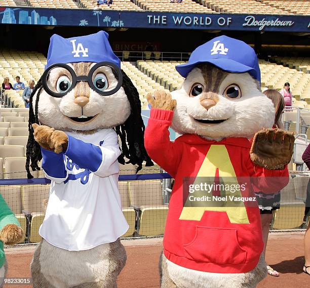 People dressed as the characters 'Alvin' and 'Simon' of the Chipmunks attend the "Alvin And The Chipmunks: The Squeakquel" DVD promotion at Dodger...
