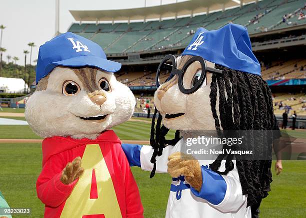 People dressed as the characters 'Alvin' and 'Simon' of the Chipmunks attend the "Alvin And The Chipmunks: The Squeakquel" DVD promotion at Dodger...