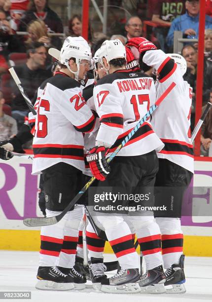 Patrik Elias of the New Jersey Devils celebrates his first period goal with an assist from Ilya Kovalchuk during a NHL game against the Carolina...