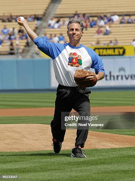 Ross Bagdasarian Jr throws the first pitch at the "Alvin And The Chipmunks: The Squeakquel" DVD promotion at Dodger Stadium on April 3, 2010 in Los...