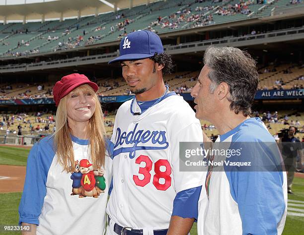 Janice Karman, Ramon Troncoso and Ross Bagdasarian Jr attend the "Alvin And The Chipmunks: The Squeakquel" DVD promotion at Dodger Stadium on April...