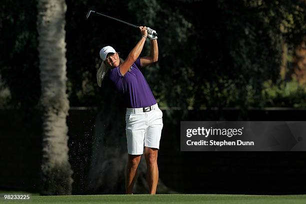 Suzann Pettersen of Norway hits her second shot on the 15th hole during the third round of the Kraft Nabisco Championship at Mission Hills Country...