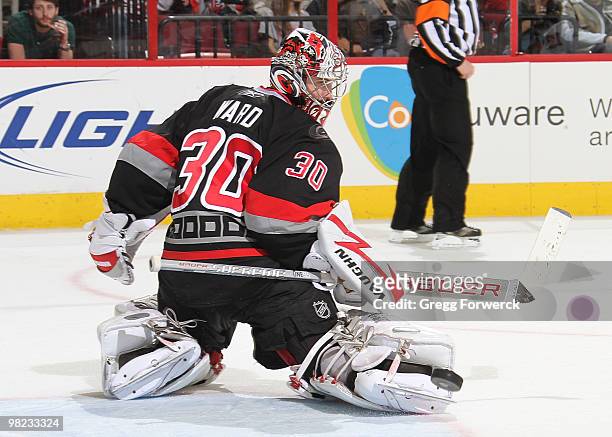 Cam Ward of the Carolina Hurricanes deflects the puck wide during a NHL game against the New Jersey Devils on April 3, 2010 at RBC Center in Raleigh,...