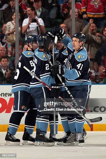 Keith Ballard of the Florida Panthers celebrates his goal with teammates against the New York Rangers at the BankAtlantic Center on April 3, 2010 in...