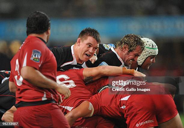 John Smit and Jannie du Plessis of the Sharks in the rolling maul during the Super 14 match between Sharks and Reds from Absa Stadium on April 03,...