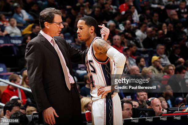 Devin Harris of the New Jersey Nets speaks with Head Coach Kiki Vandeweghe during a game against the New Orleans Hornets on April 3, 2010 at Izod...