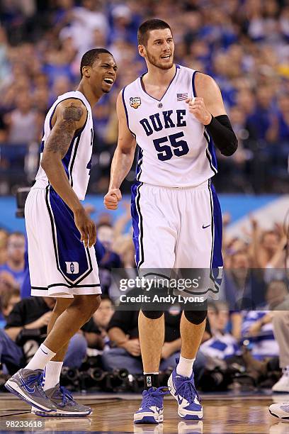 Brian Zoubek and Lance Thomas of the Duke Blue Devils react to a play in the first half against the West Virginia Mountaineers during the National...