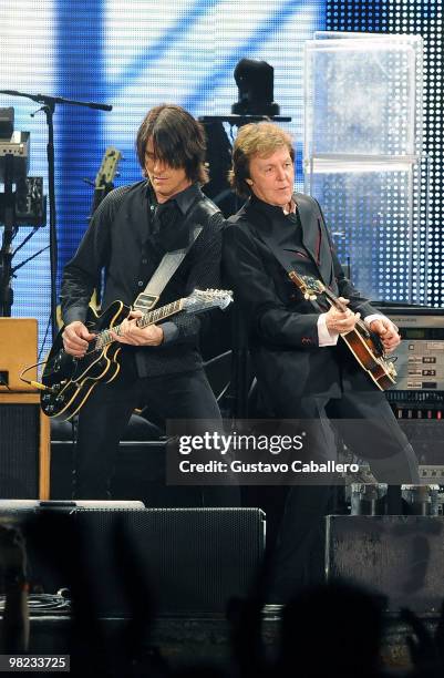 Rusty Anderson and Paul McCartney performs at Sun Life Stadium on April 3, 2010 in Miami, Florida.