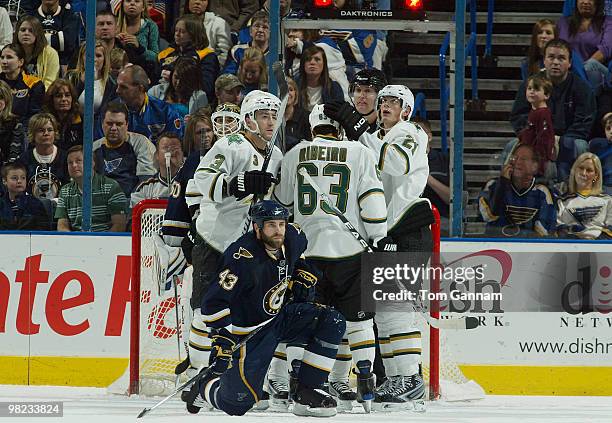 Stephane Robidas, Mike Ribeiro, and Loui Eriksson of the Dallas Stars celebrate a goal by teammate Brenden Morrow as Mike Weaver of the St. Louis...