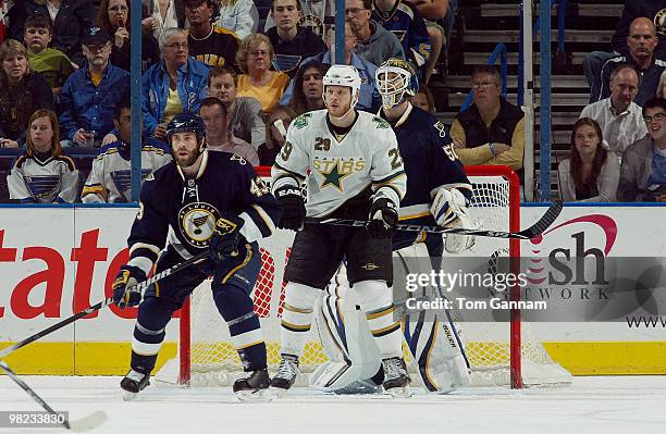 Mike Weaver and Chris Mason of the St. Louis Blues defend against Steve Ott of the Dallas Stars on April 03, 2010 at Scottrade Center in St. Louis,...