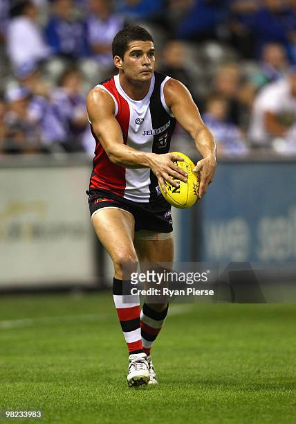 Leigh Montagna of the Saints runs with the ball during the round two AFL match between the St Kilda Saints and the North Melbourne Kangaroos at...