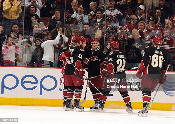 Matthew Lombardi, Derek Morris, Lee Stempniak, and Wojtek Wolski of the Phoenix Coyotes celebrate after a goal against the Edmonton Oilers on April...