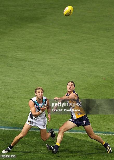 Darren Glass of the Eagles and Jay Schulz of the Power contest a mark during the round two AFL match between the West Coast Eagles and Port Adelaide...