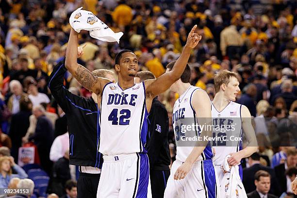 Lance Thomas of the Duke Blue Devils reacts in the second half from the bench while taking on the West Virginia Mountaineers during the National...