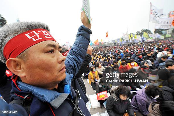 SKorea-economy-labour by Jun Kwanwoo Labour union members from the Korean Confederation of Trade Unions shout slogans during a rally against the...